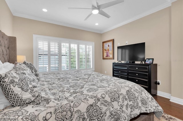 bedroom with ceiling fan, ornamental molding, and dark hardwood / wood-style floors