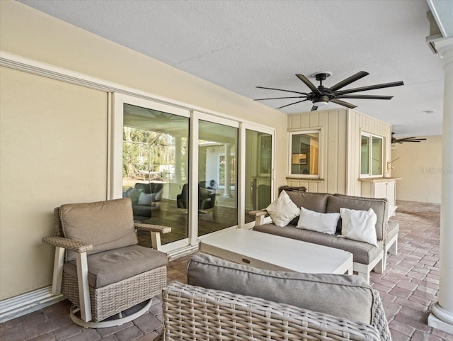 view of patio featuring ceiling fan and outdoor lounge area