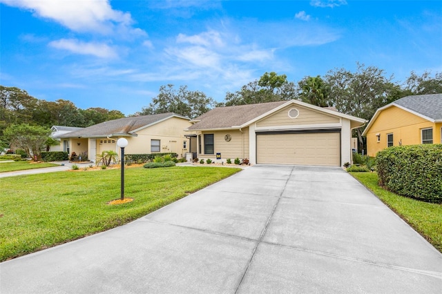 single story home featuring a front lawn and a garage