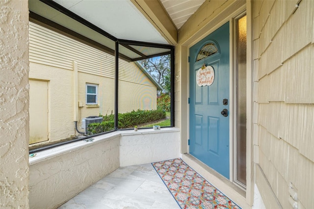 doorway to property with central AC