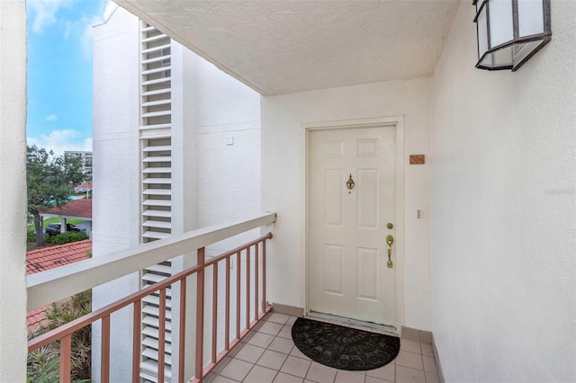 doorway to property with a balcony