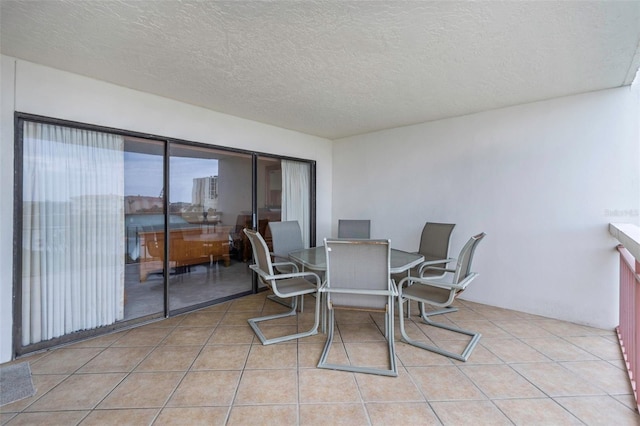 view of patio featuring a balcony