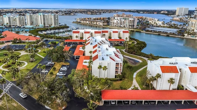 birds eye view of property featuring a water view