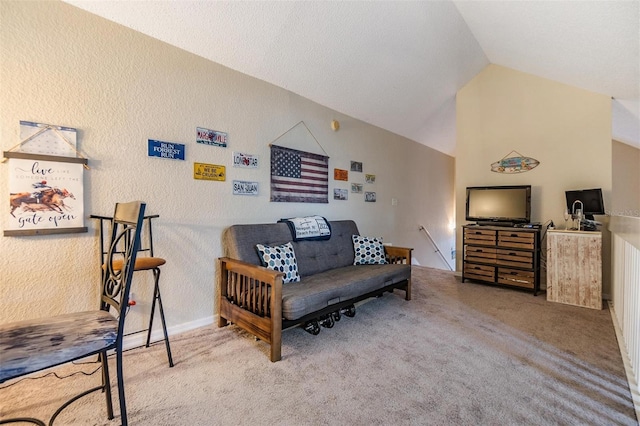 living area with lofted ceiling and light carpet