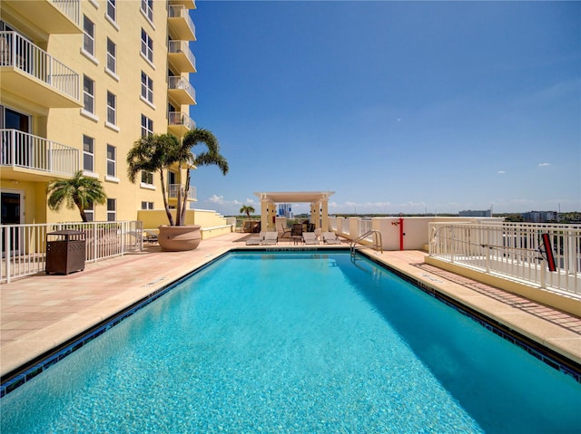 view of pool featuring a patio