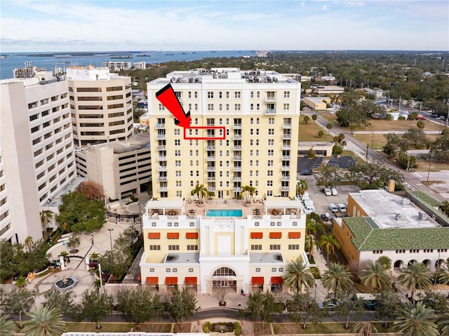 birds eye view of property featuring a water view