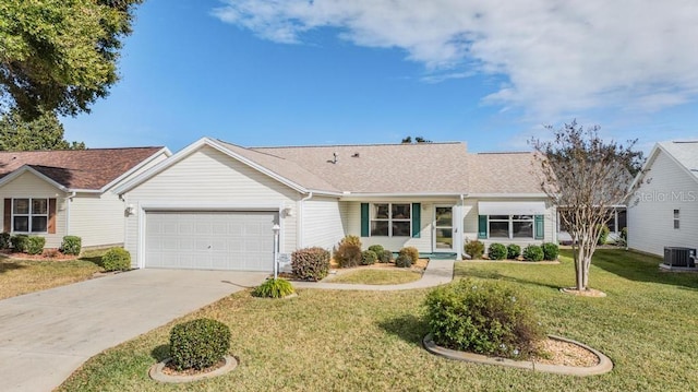 ranch-style house with a front yard, a garage, and central AC