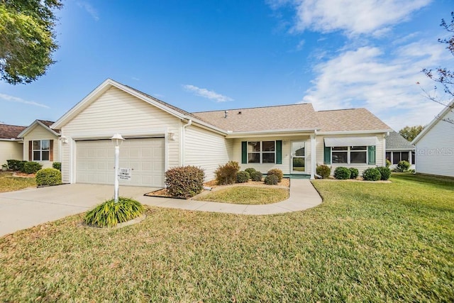 single story home with a front yard and a garage