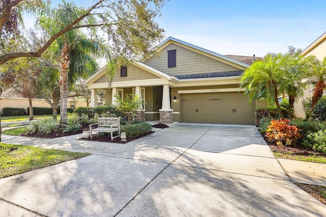 craftsman house with a garage