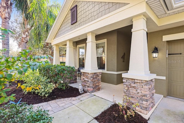 entrance to property featuring a porch