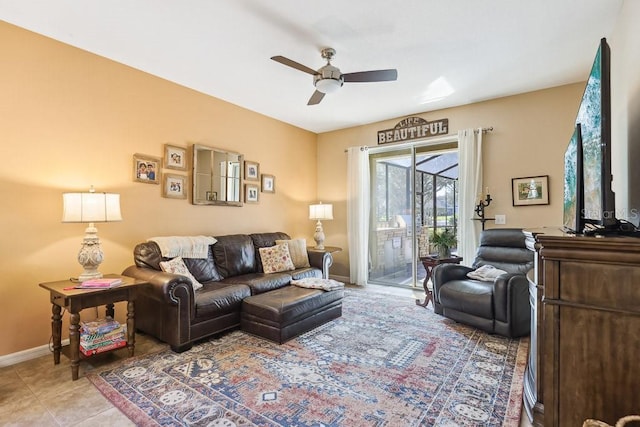 tiled living room with ceiling fan