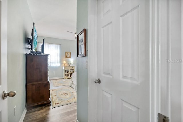 hall with light wood-type flooring