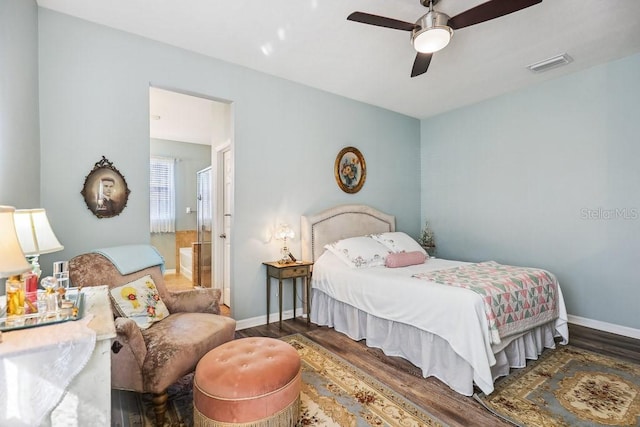 bedroom featuring ceiling fan and dark hardwood / wood-style floors