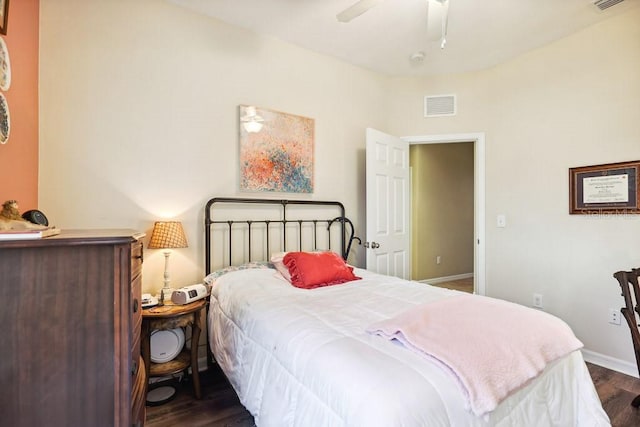 bedroom featuring dark wood-type flooring and ceiling fan