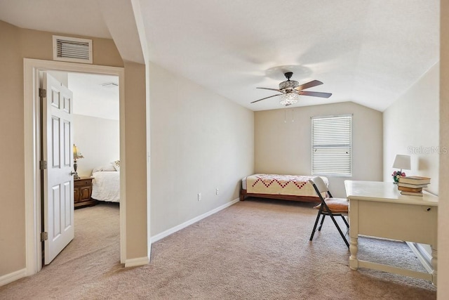 carpeted bedroom with ceiling fan and lofted ceiling