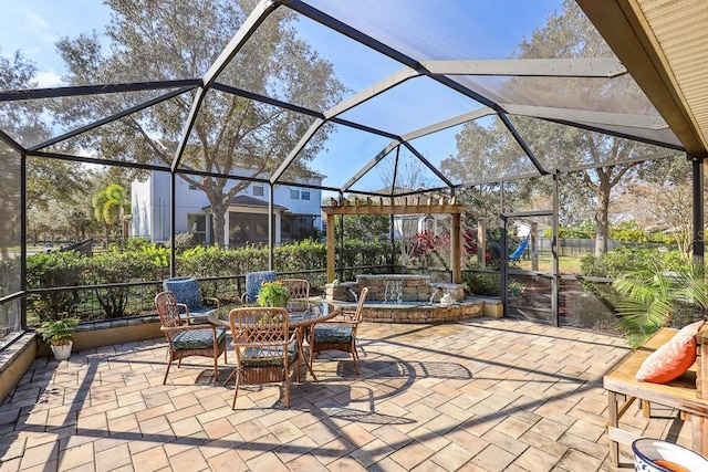 view of patio / terrace with glass enclosure