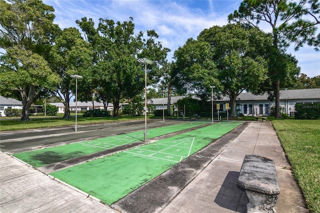 view of home's community featuring a yard