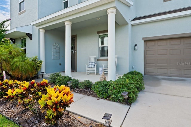 property entrance featuring covered porch