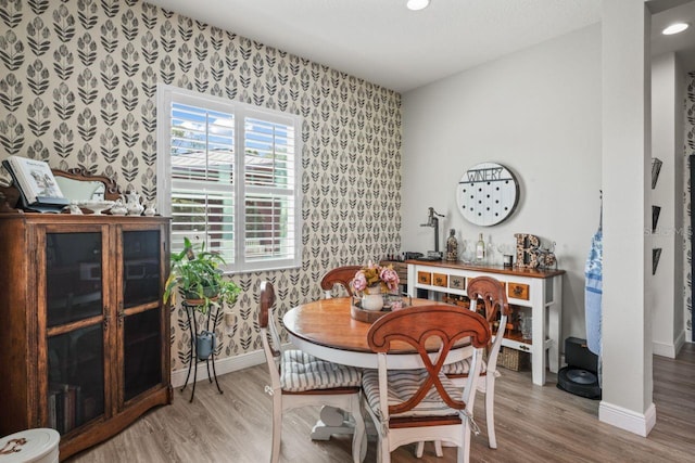 dining room with hardwood / wood-style floors