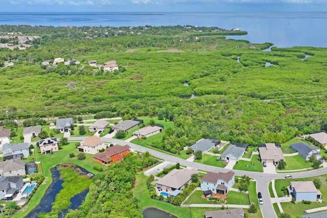 bird's eye view with a water view