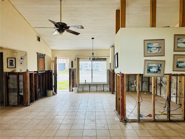 interior space with ceiling fan, wooden ceiling, light tile patterned floors, and high vaulted ceiling