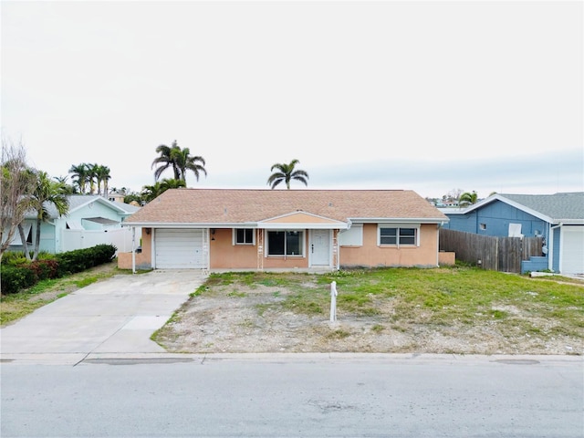 single story home with a garage