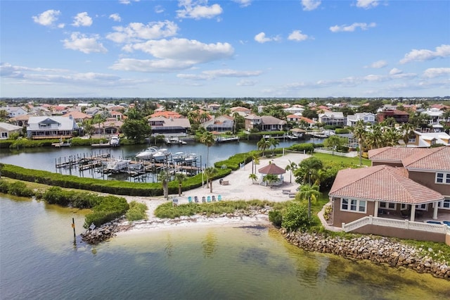 birds eye view of property featuring a residential view and a water view