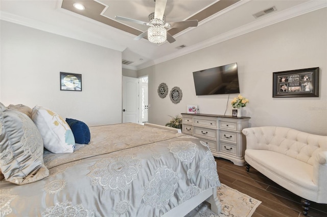 bedroom featuring visible vents, ceiling fan, wood tiled floor, and crown molding