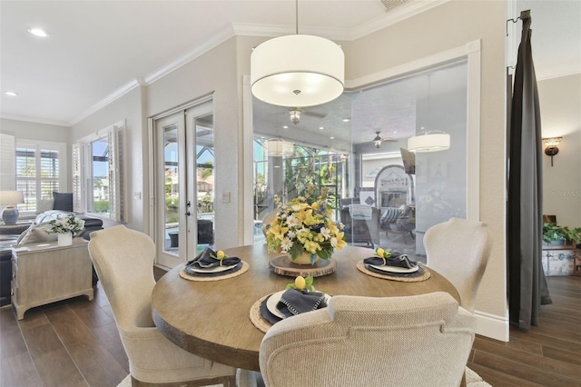 dining space featuring recessed lighting, french doors, dark wood-style floors, and crown molding