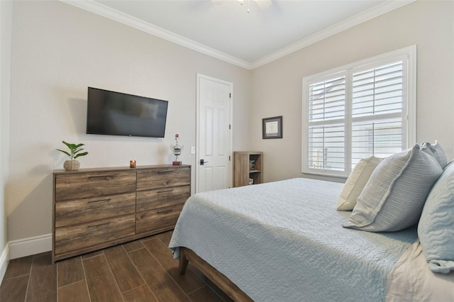 bedroom with crown molding and ceiling fan