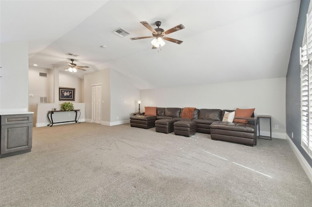 carpeted living room featuring vaulted ceiling and ceiling fan