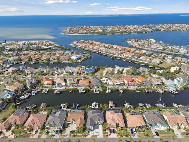 aerial view featuring a residential view and a water view