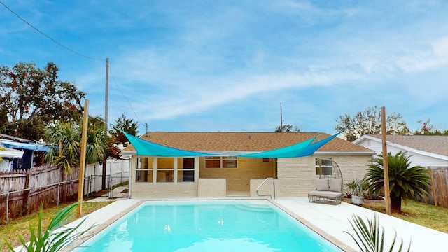 view of pool featuring a patio area