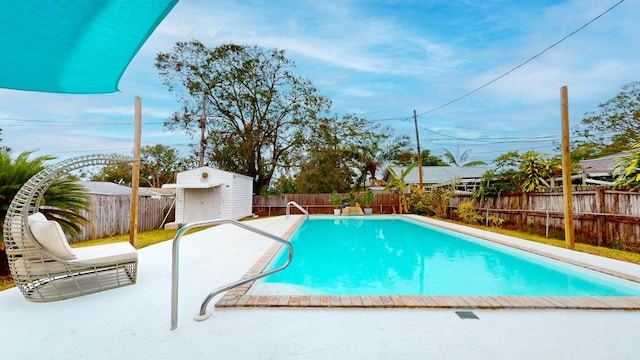 view of swimming pool featuring a storage unit