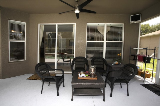 view of patio with ceiling fan and an outdoor hangout area