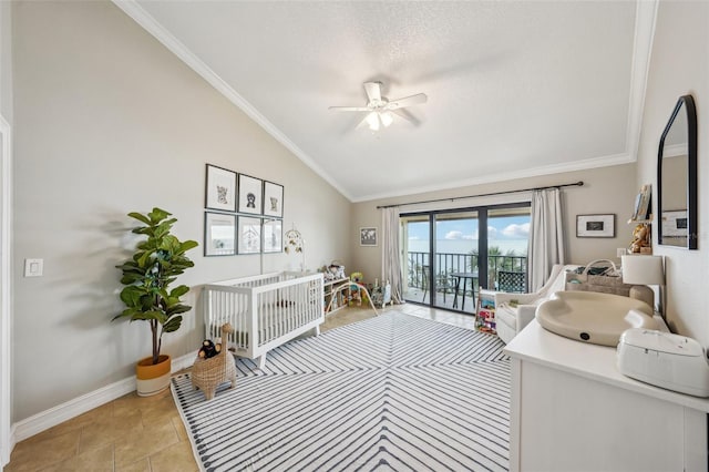 bedroom featuring light tile patterned floors, ceiling fan, access to exterior, a textured ceiling, and vaulted ceiling