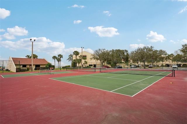 view of tennis court with basketball court