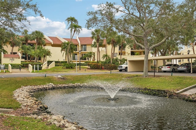 view of community featuring a water view