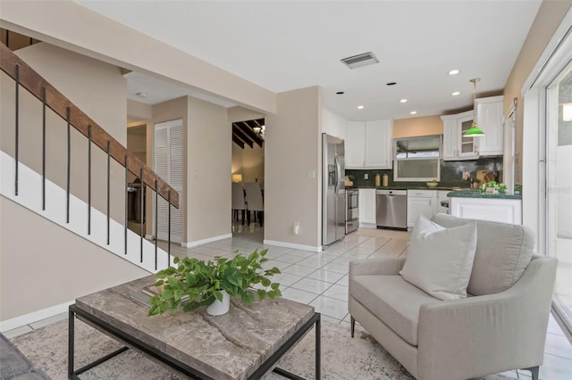 living room featuring light tile patterned floors