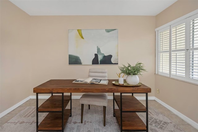 office area with a healthy amount of sunlight and light tile patterned floors