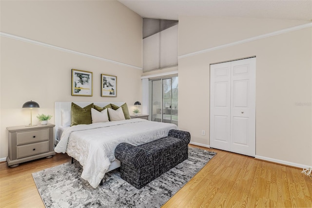 bedroom featuring a closet and light wood-type flooring