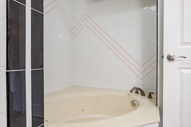 bathroom featuring a washtub