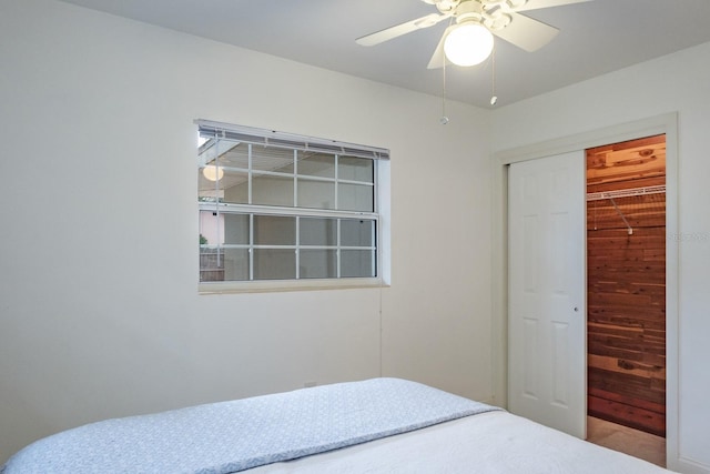 bedroom with a closet and ceiling fan