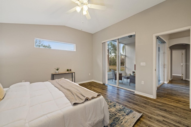 bedroom featuring vaulted ceiling, dark wood-type flooring, ceiling fan, and access to exterior