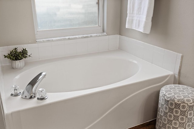 bathroom featuring a tub