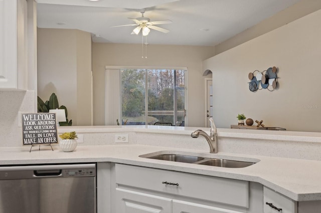 kitchen with white cabinets, ceiling fan, stainless steel dishwasher, and sink