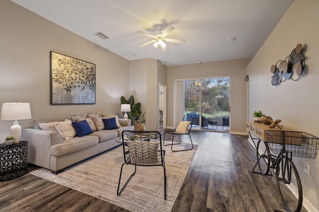 living room with ceiling fan and hardwood / wood-style flooring