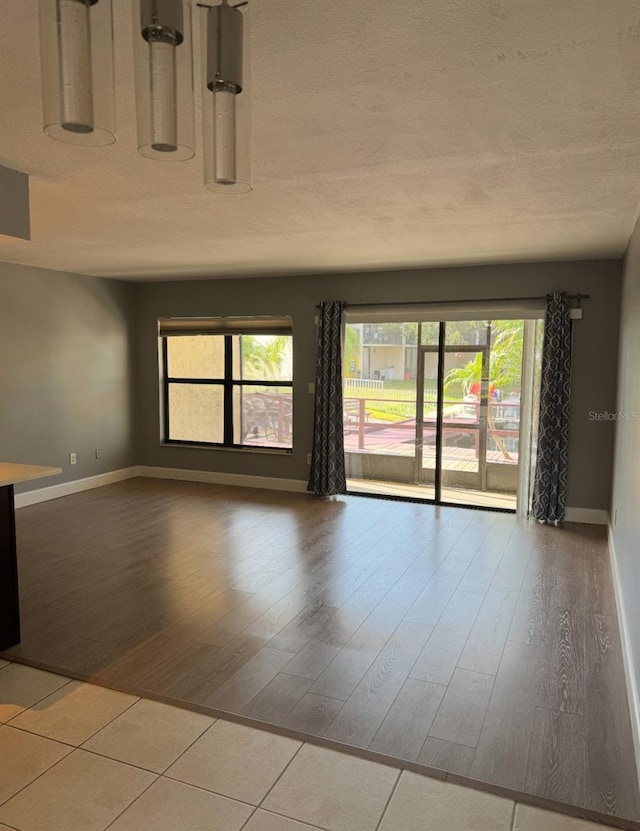 unfurnished room featuring light hardwood / wood-style floors