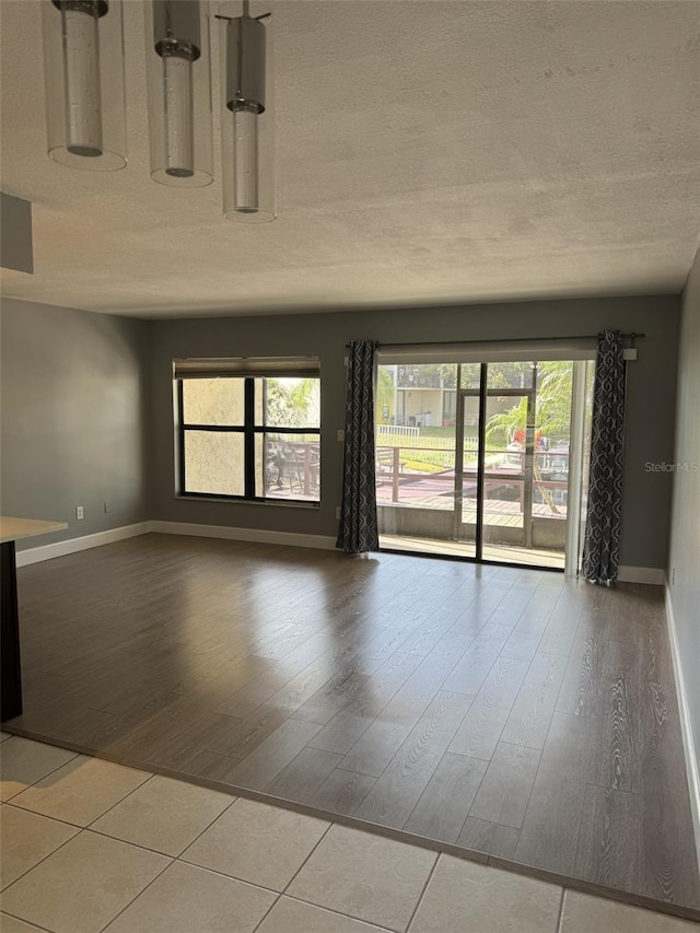 unfurnished room featuring light hardwood / wood-style floors