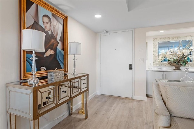 entrance foyer with light hardwood / wood-style flooring